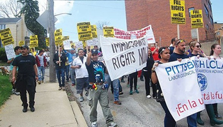 Martin Esquivel-Hernandez, center, at an immigrant-rights rally the day before he was detained. (Ryan Deto/Pittsburgh City Paper)